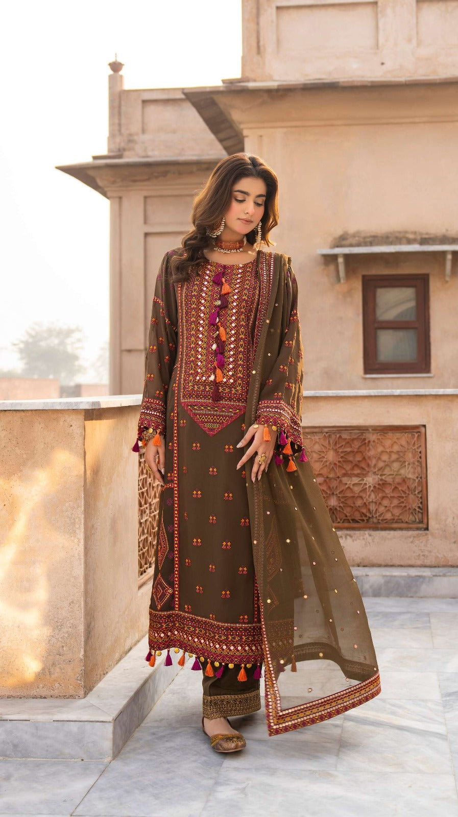 Luxury Olive Green Embroidered Designer Suit with Handcrafted Mirror Work & Tassel Accents